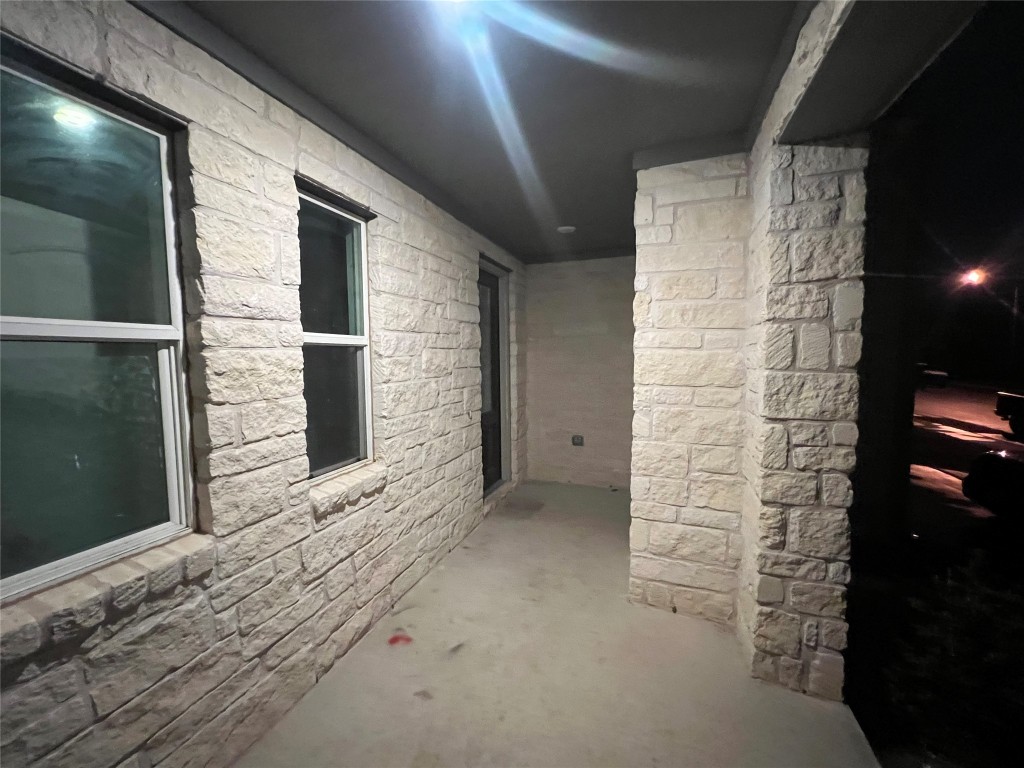 112 West Point Way Elgin, TX 78621 - Photo 5 of 9 a view of an empty room with a fireplace