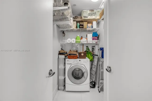 a utility room with dryer and washer