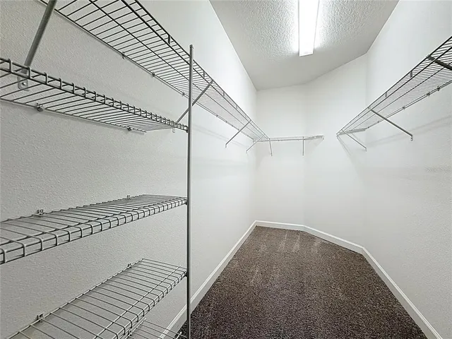 a view of a room with racks on the wall