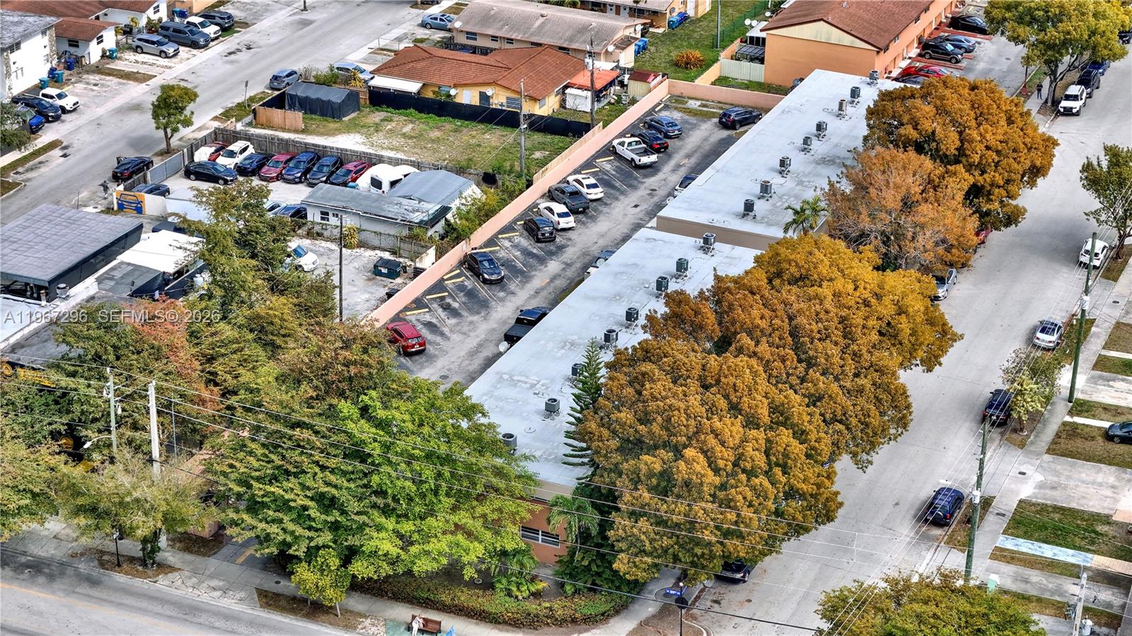 10881 Southwest 6th Street, Unit 7 Sweetwater, FL 33174 - Photo 3 of 34 an aerial view of a house outdoor space and street view