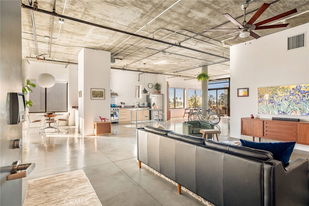 a lobby with furniture and window