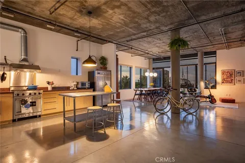 a view of a kitchen with appliances and cabinets