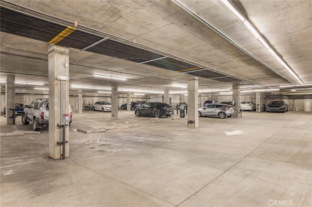 835 Locust Avenue, Unit 519 Long Beach, CA 90813 - Photo 36 of 42 a view of parking garage with cars