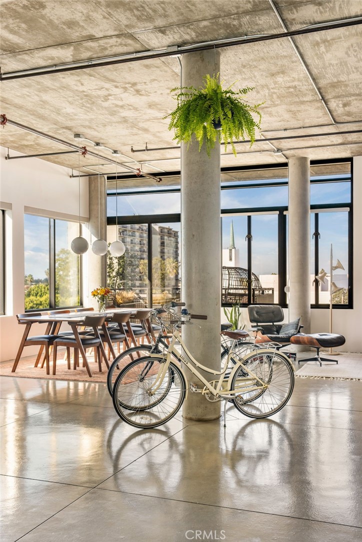 835 Locust Avenue, Unit 519 Long Beach, CA 90813 - Photo 9 of 42 a very nice looking living room with furniture and floor to ceiling window