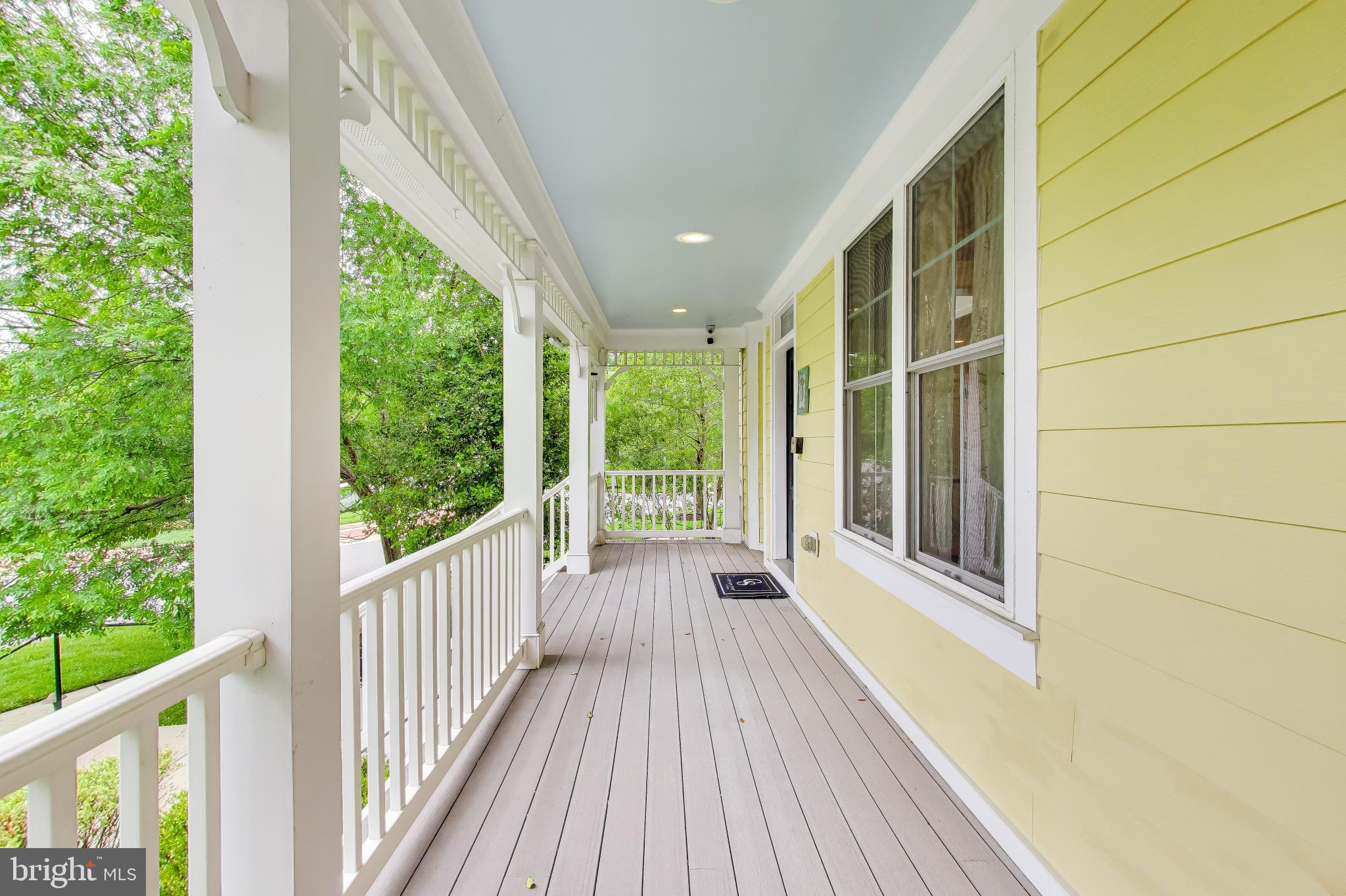 13513 Moonlight Trail Drive Silver Spring, MD 20906 - Photo 6 of 78 a view of porch with a floor to ceiling window and wooden floor