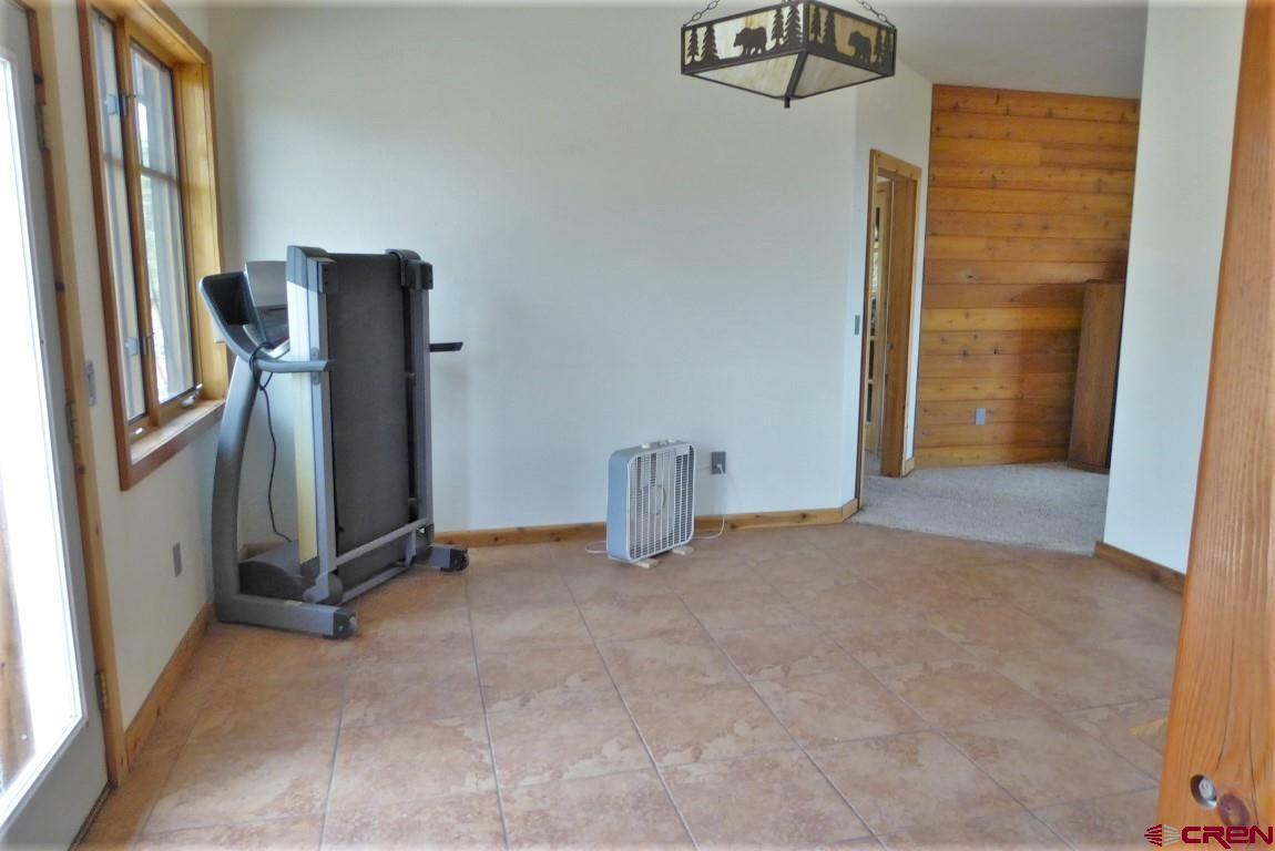 19850 2325th Road Cedaredge, CO 81413 - Photo 13 of 35 an empty room with windows