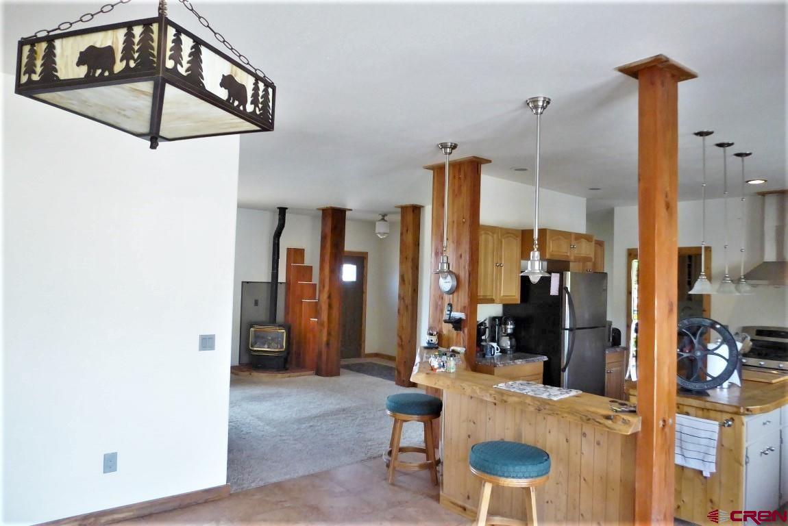 19850 2325th Road Cedaredge, CO 81413 - Photo 14 of 35 a very nice looking room with a dining table