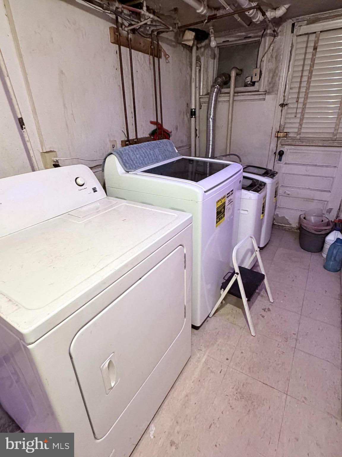 1328 Rittenhouse Street Northwest Washington, DC 20011 - Photo 9 of 10 a utility room with dryer and washer