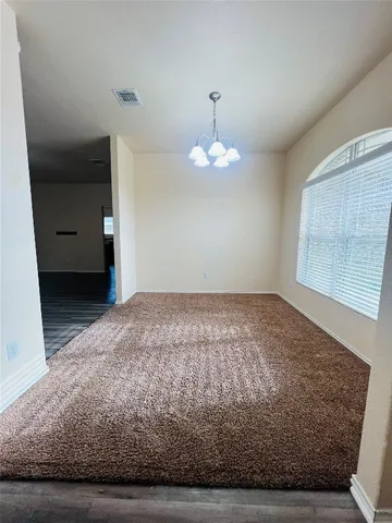a view of a livingroom with a fireplace