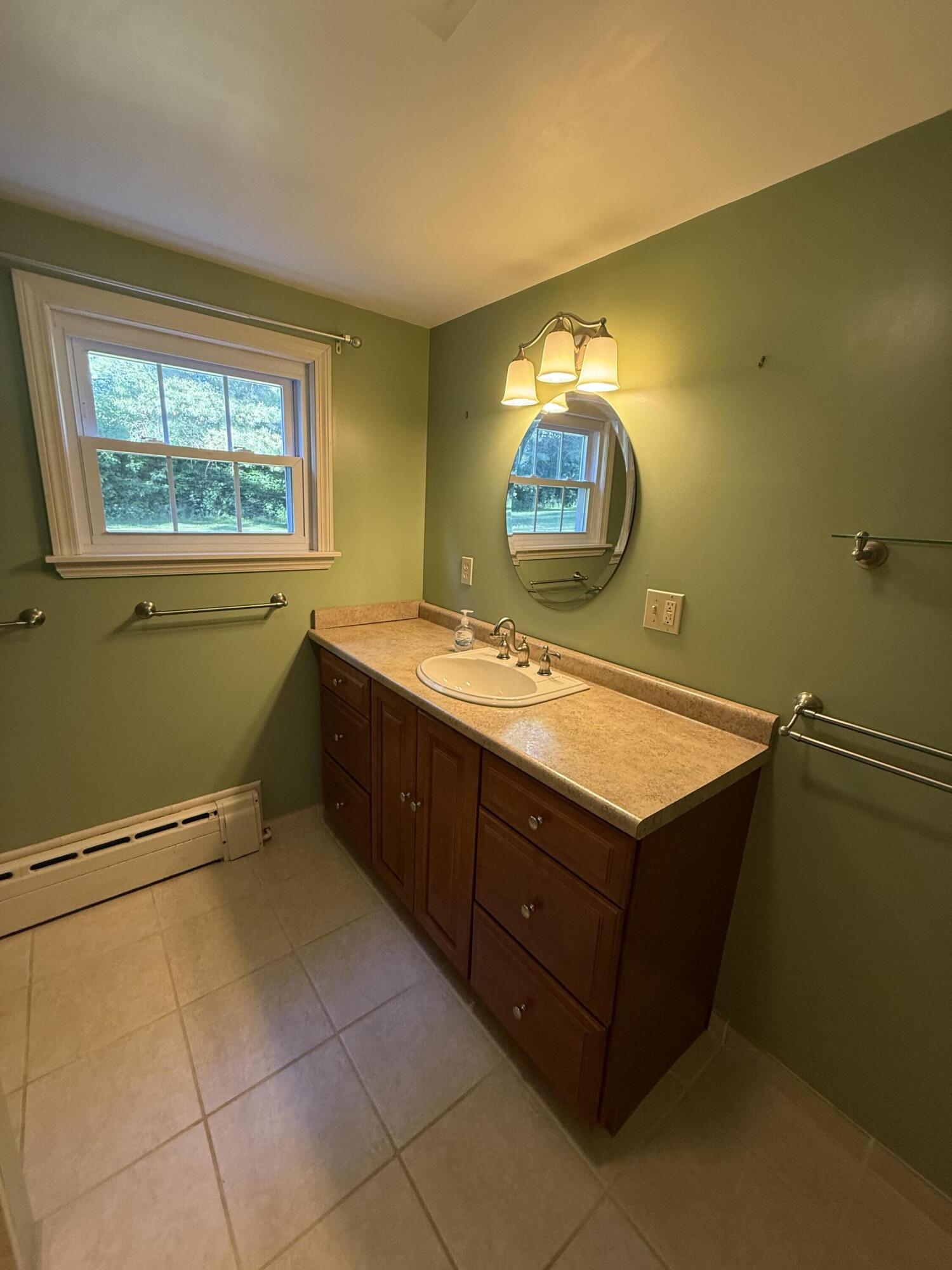 36 Pinewood Drive Cumberland, ME 04021 - Photo 34 of 38 bsmt bath vanity