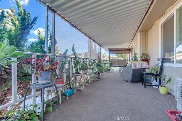 a view of outdoor sitting area with furniture