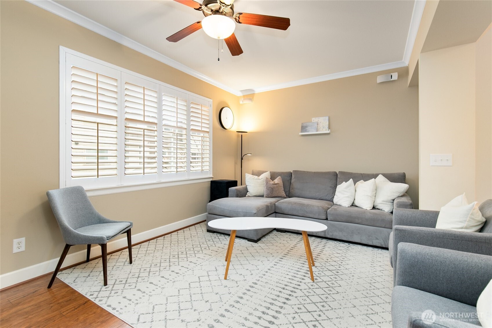 320 Chelan Place Northeast, Unit H1 Renton, WA 98059 - Photo 13 of 30 a living room with furniture and a large window