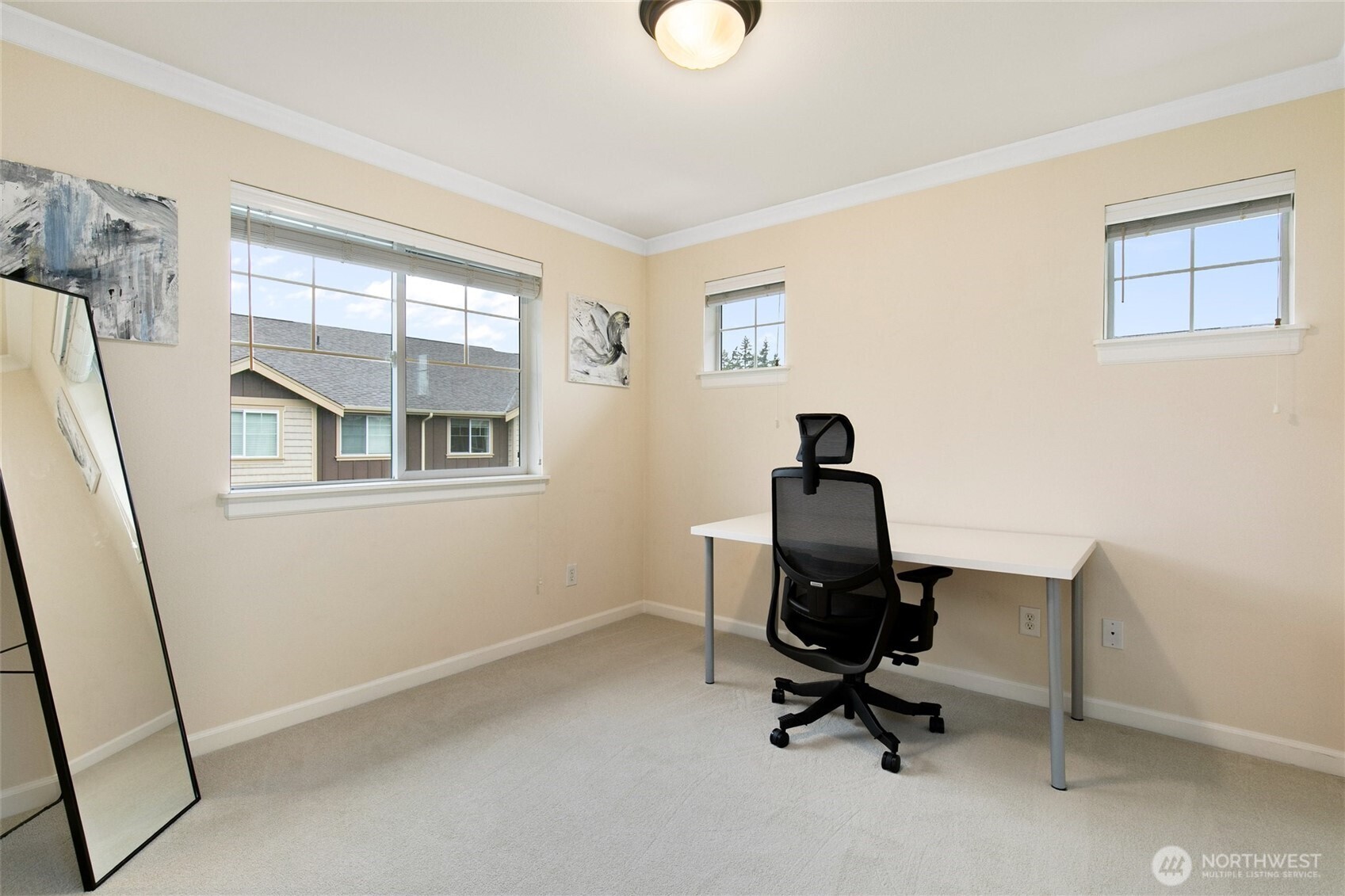 320 Chelan Place Northeast, Unit H1 Renton, WA 98059 - Photo 22 of 30 a view of a workspace with furniture and a window