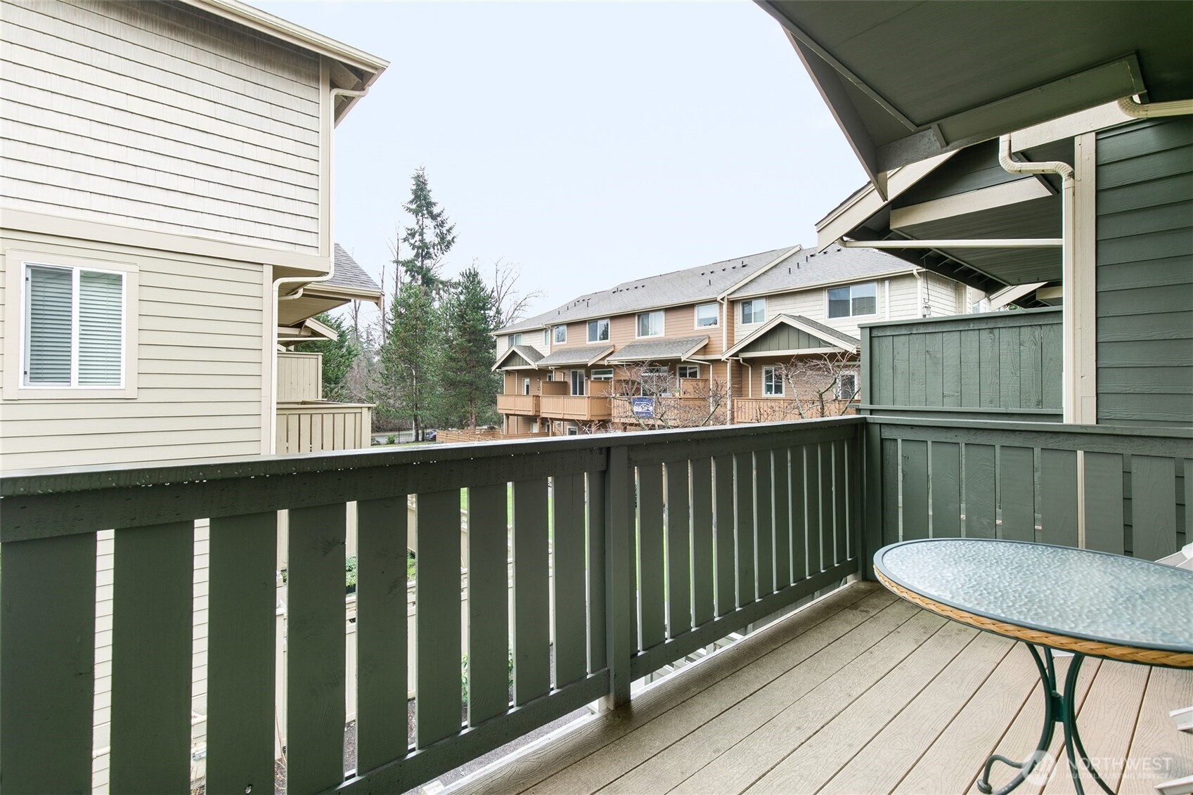 320 Chelan Place Northeast, Unit H1 Renton, WA 98059 - Photo 9 of 30 a balcony view with a seating space