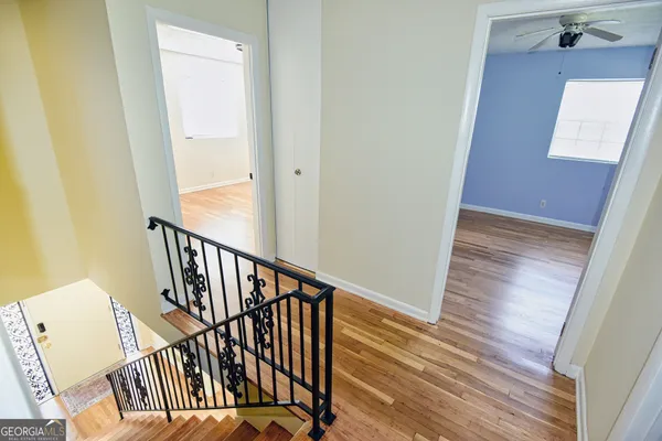 a view of entryway with wooden floor