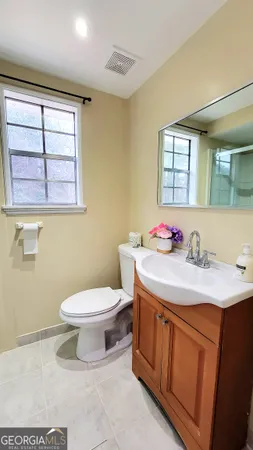 a bathroom with a sink and a toilet