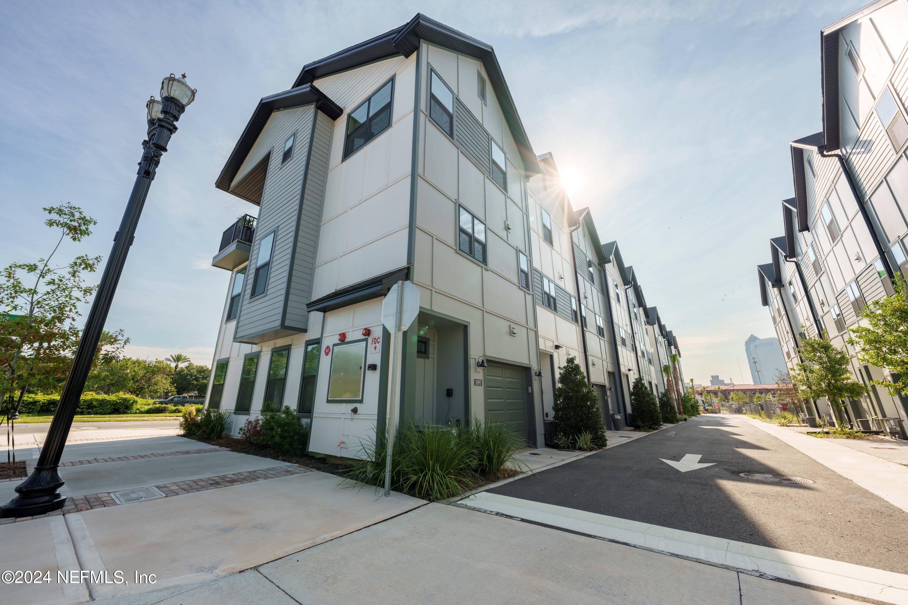 159 Barstow Place Jacksonville, FL 32204 - Photo 1 of 35 a view of a building along with street