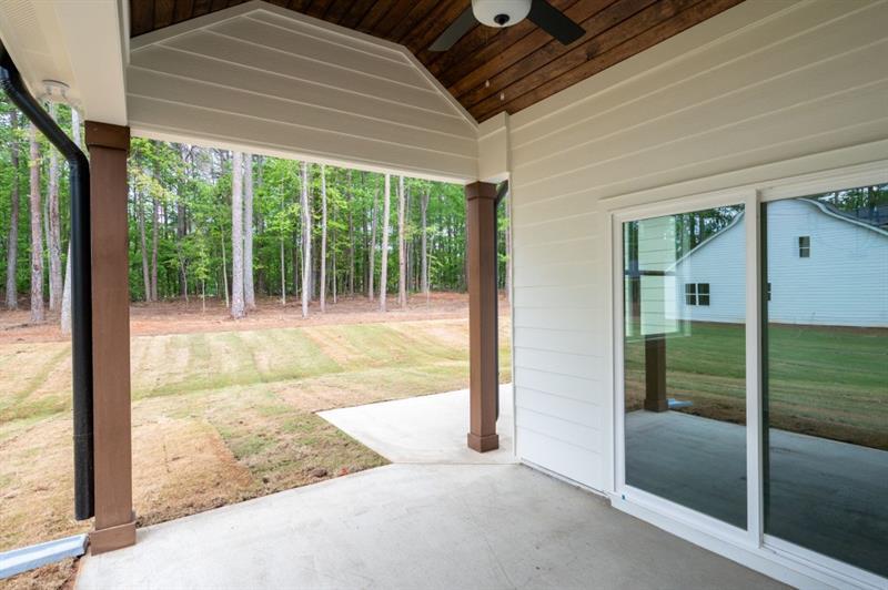 150 Doris Path Temple, GA 30179 - Photo 32 of 36 a view of porch with a floor to ceiling window and a yard