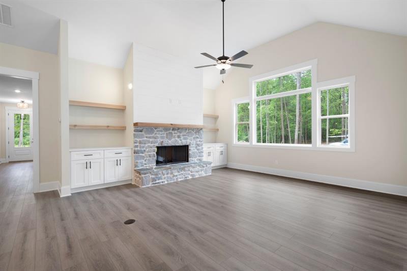 150 Doris Path Temple, GA 30179 - Photo 9 of 36 a view of empty room with wooden floor and fireplace