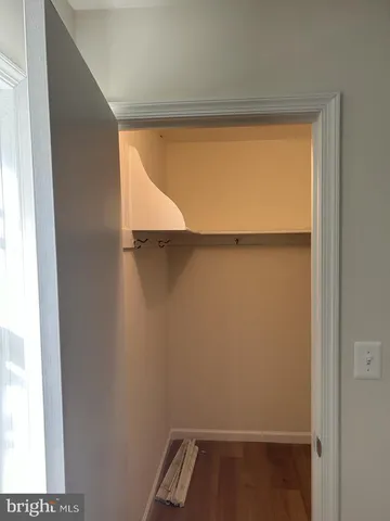 a view of small space with racks on the wall