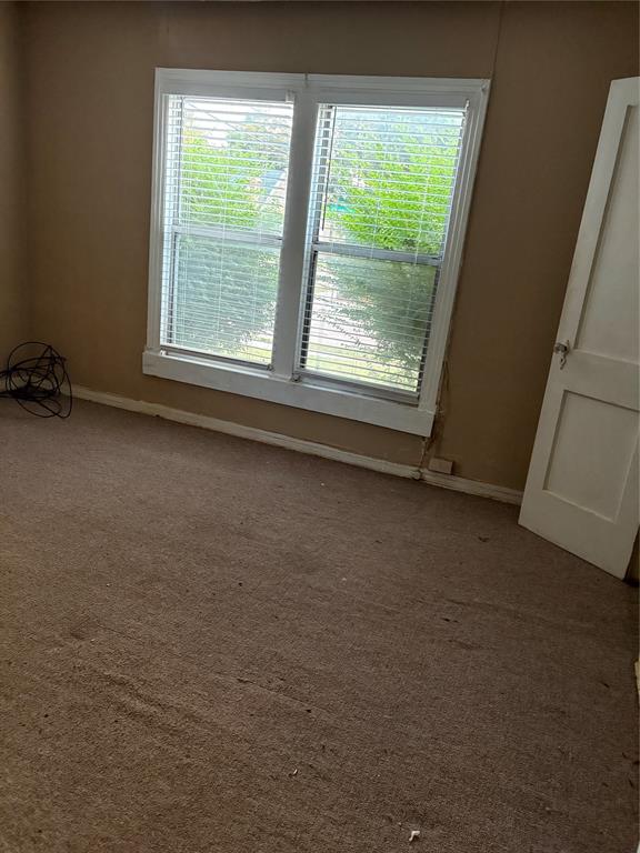 3424 Kimble Street Dallas, TX 75215 - Photo 3 of 5 a view of a room with window
