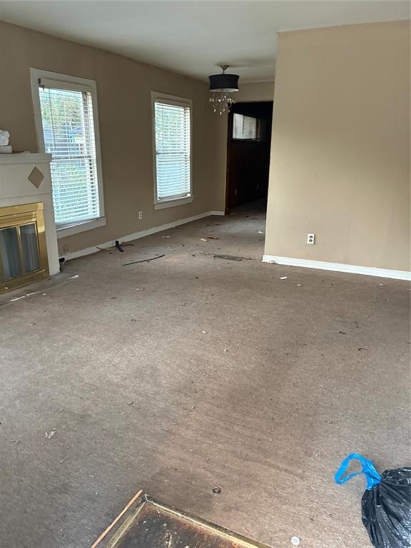 3424 Kimble Street Dallas, TX 75215 - Photo 5 of 5 an empty room with windows