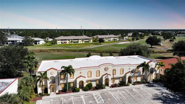an aerial view of a house with a garden