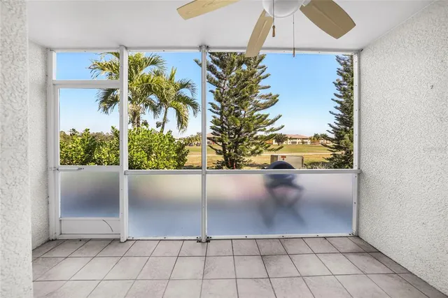 a view of a hallway with stairs