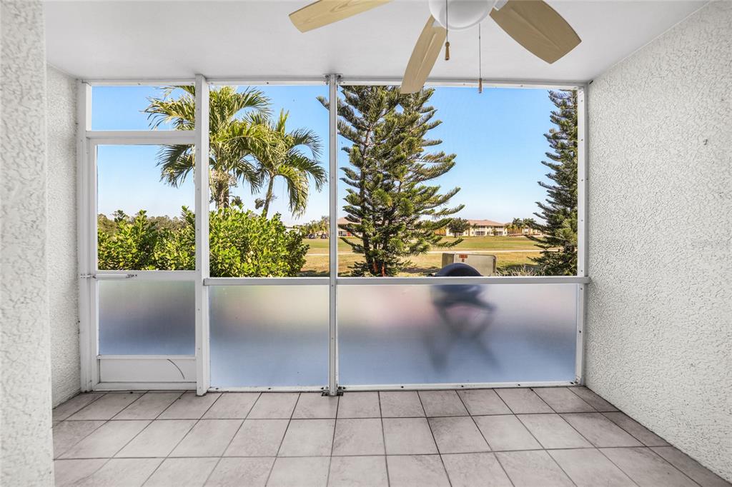 1246 Rio De Janeiro Avenue, Unit 505 Punta Gorda, FL 33983 - Photo 17 of 49 a view of a potted plant with a tree