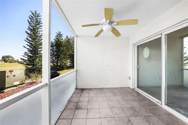 a view of a backyard with sitting area