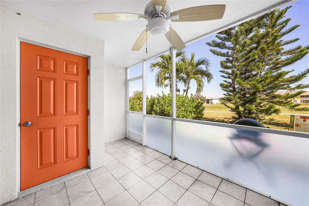 1246 Rio De Janeiro Avenue, Unit 505 Punta Gorda, FL 33983 - Photo 19 of 49 a view of an entryway with a chandelier