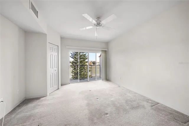 an aerial view of residential houses with outdoor space and river