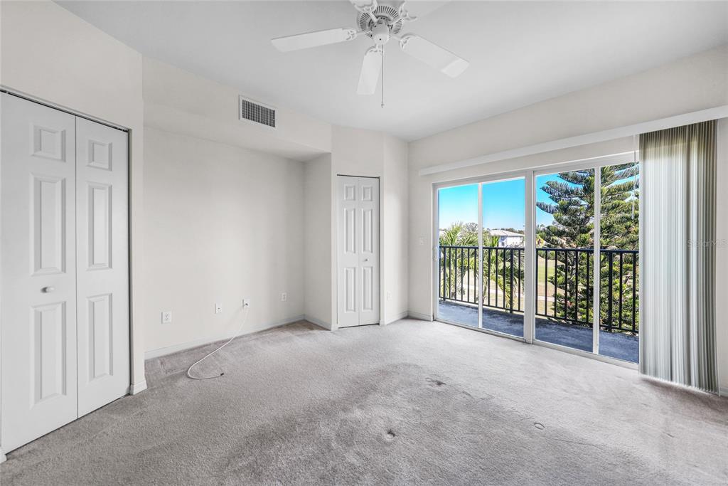 1246 Rio De Janeiro Avenue, Unit 505 Punta Gorda, FL 33983 - Photo 22 of 49 a view of an empty room with windows