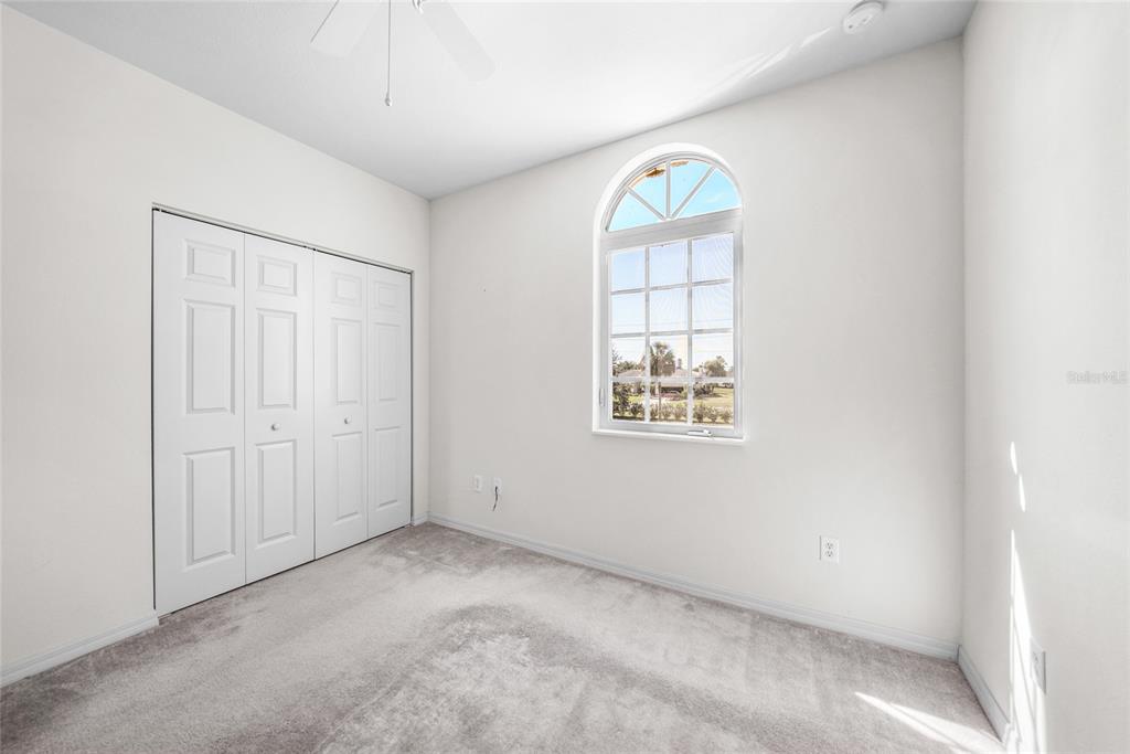 1246 Rio De Janeiro Avenue, Unit 505 Punta Gorda, FL 33983 - Photo 27 of 49 an empty room with a window