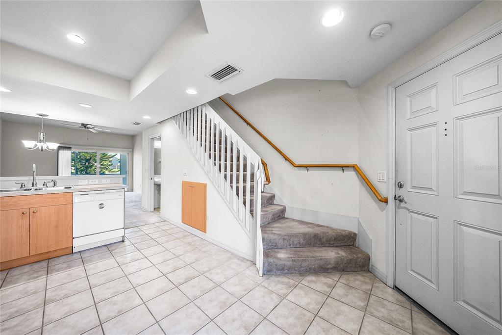 1246 Rio De Janeiro Avenue, Unit 505 Punta Gorda, FL 33983 - Photo 7 of 49 a view of entryway and hall with wooden floor