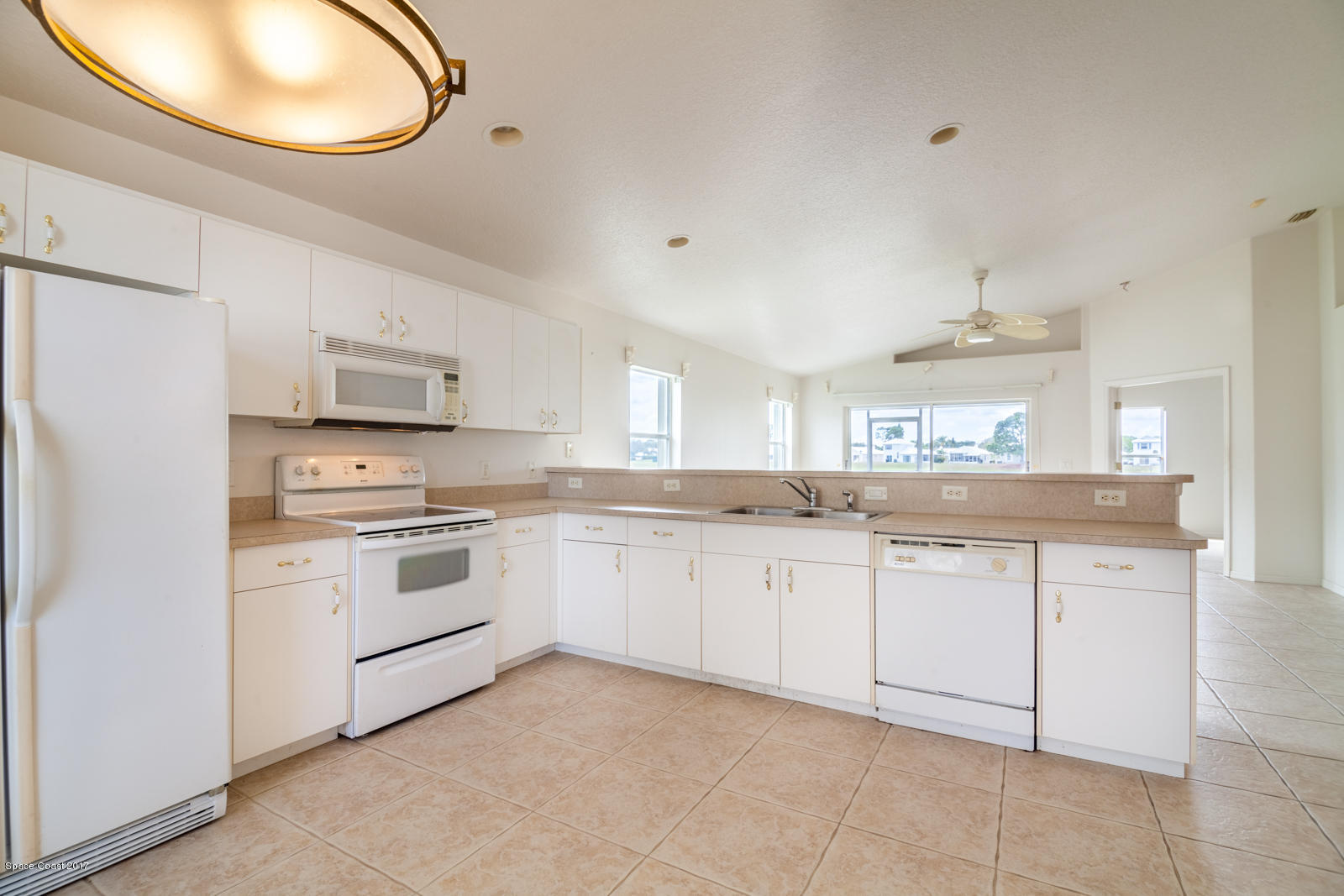 2158 Spring Creek Circle Palm Bay, FL 32905 - Photo 2 of 17 Spacious Kitchen w/Breakfast Bar