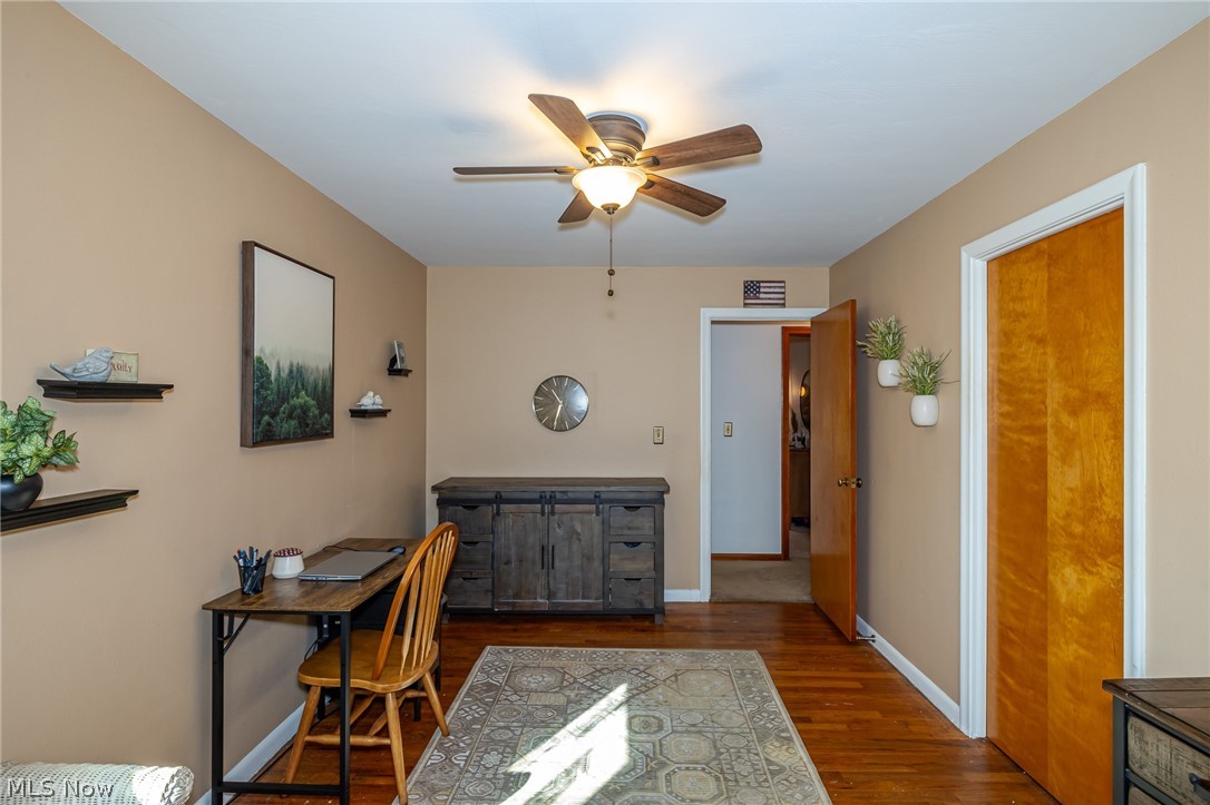 180 South Leavitt Road Amherst, OH 44001 - Photo 17 of 37 Office (potential bedroom)featuring a ceiling fan and dark wood finished floors