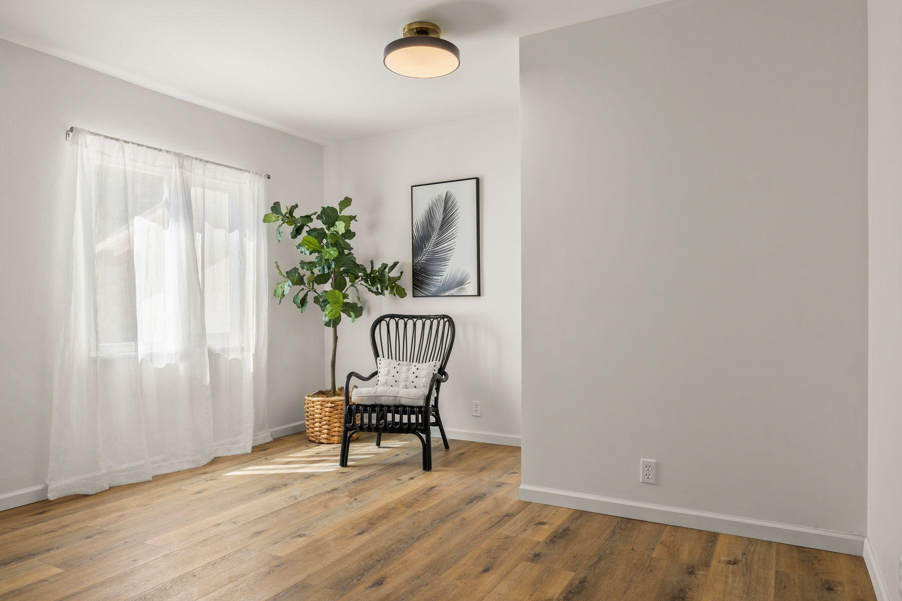 375 North Poli Avenue Ojai, CA 93023 - Photo 14 of 24 a chair and a table in a room