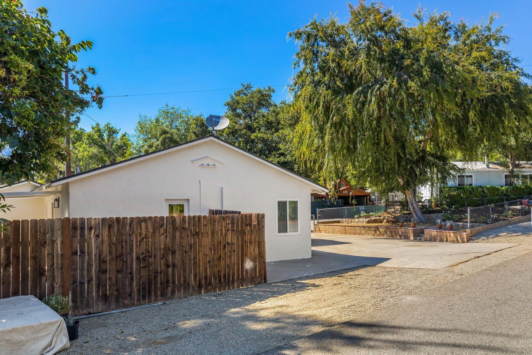 375 North Poli Avenue Ojai, CA 93023 - Photo 22 of 24 a view of a parking space with large trees