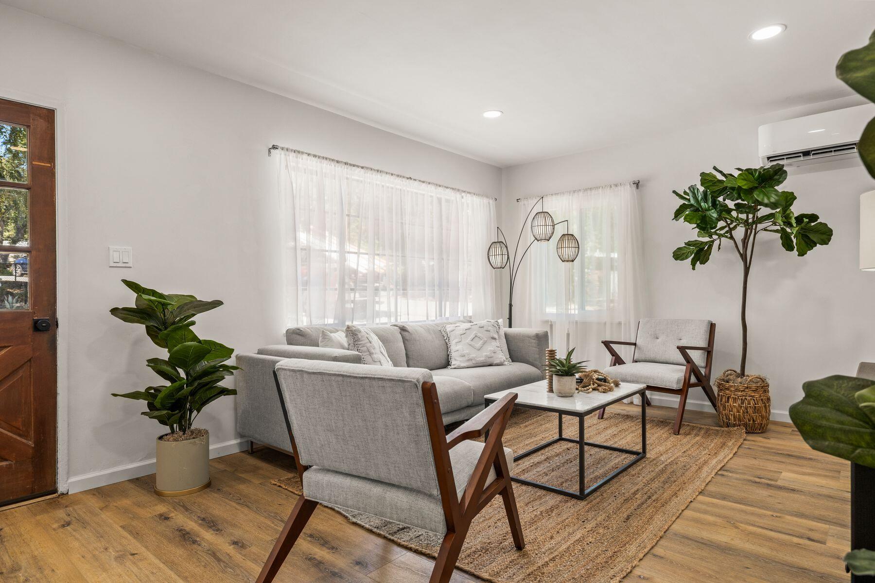 375 North Poli Avenue Ojai, CA 93023 - Photo 4 of 24 a living room with furniture and a potted plant