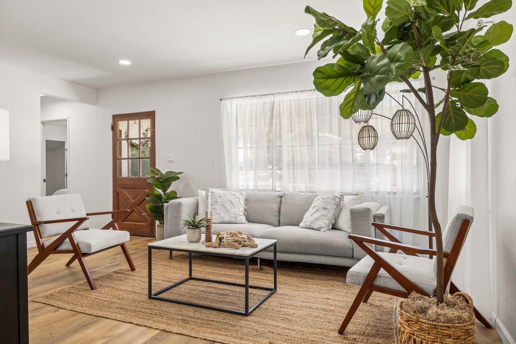 375 North Poli Avenue Ojai, CA 93023 - Photo 5 of 24 a living room with furniture and a potted plant