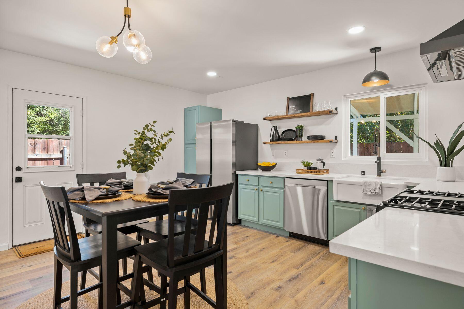 375 North Poli Avenue Ojai, CA 93023 - Photo 7 of 24 a kitchen with a table and chairs in it
