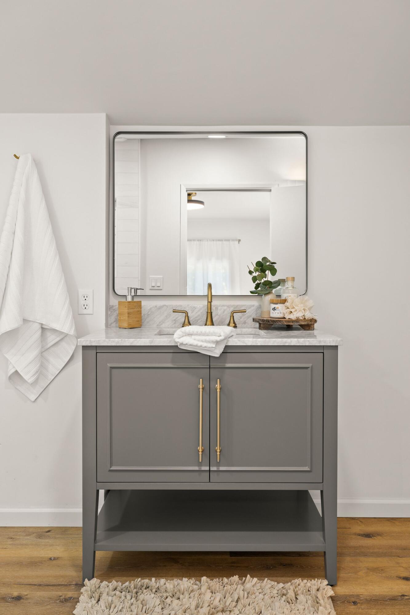 375 North Poli Avenue Ojai, CA 93023 - Photo 10 of 24 a bathroom with a sink and a mirror
