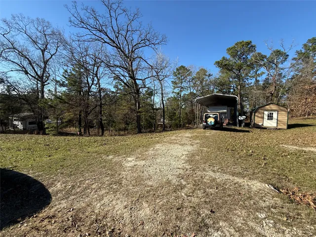 a view of street with parked cars