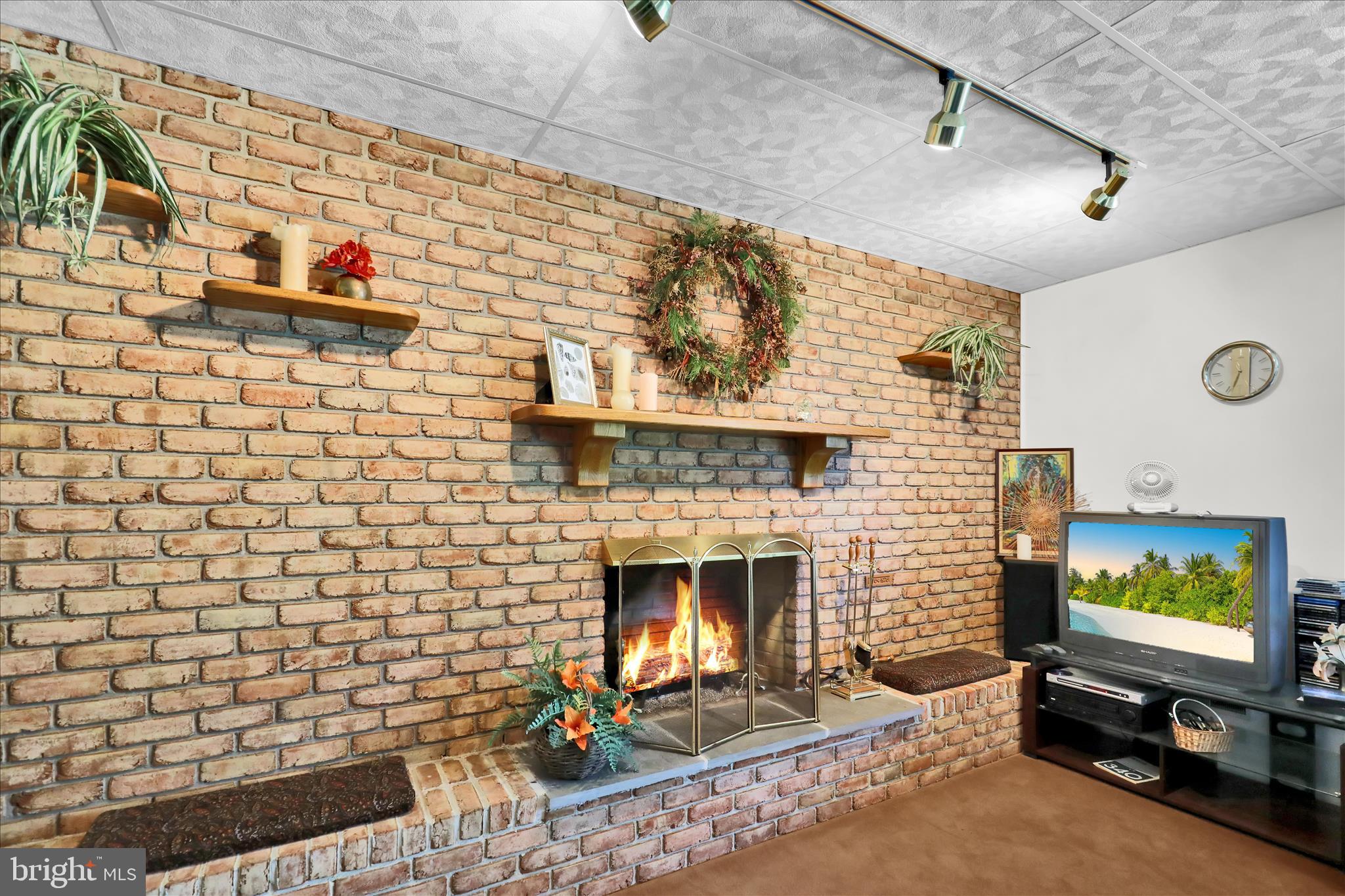 1620 Commonwealth Boulevard Reading, PA 19607 - Photo 36 of 55 LL - brick wall fireplace