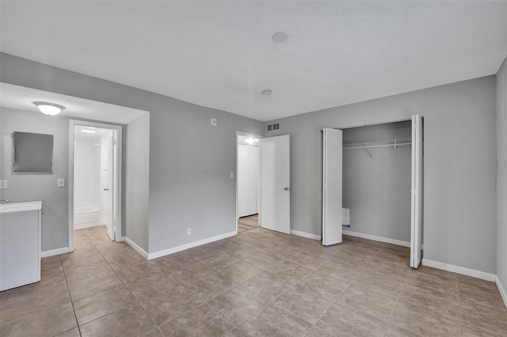 555 Southeast 8th Street, Unit 252 Deerfield Beach, FL 33441 - Photo 7 of 18 a view of an empty room and a bathroom