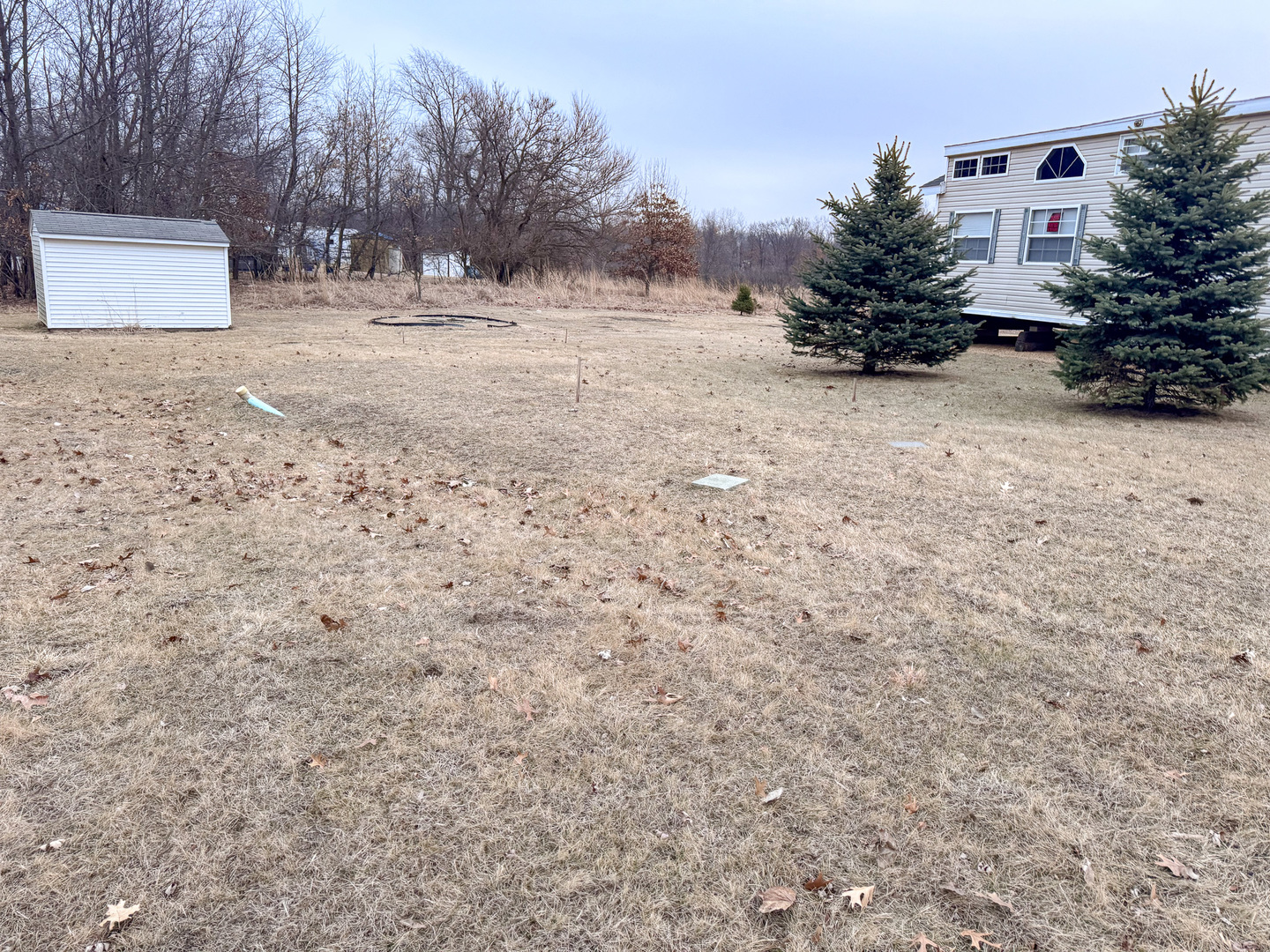 23-15 Woodhaven Sublette, IL 61367 - Photo 3 of 4 a view of a yard covered in snow