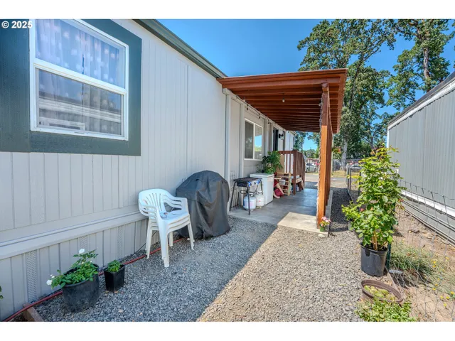 a backyard of a house with lots of green space
