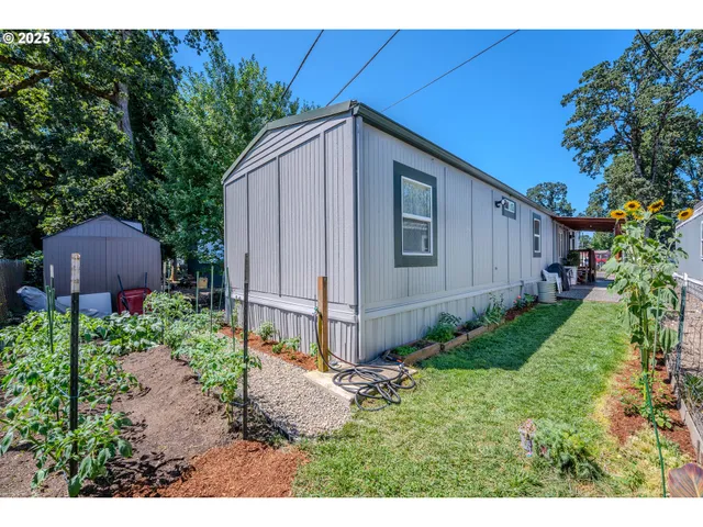 a backyard of a house with lots of green space