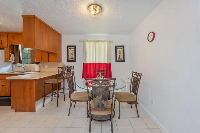 a view of a dining room with furniture